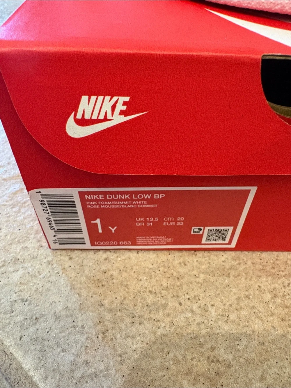 Nike Kids Pink and Red Low-Top Sneakers with White Swoosh